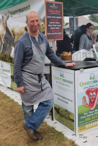 Ray standing beside his stand at Bloom 2011